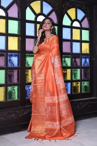 Orange silk soft saree with zari borders
