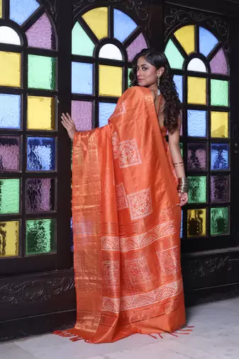 Orange silk soft saree with zari borders