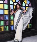 Off white cotton handwoven saree with texture borders