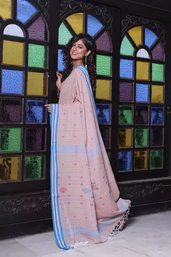 Beige cotton handwoven saree with floral buttas