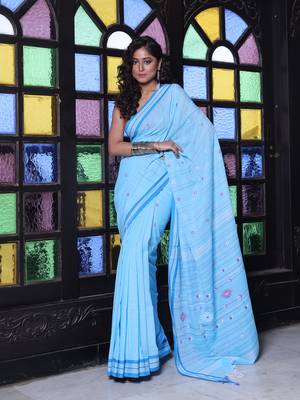 Sky blue cotton handwoven saree with floral buttas 1