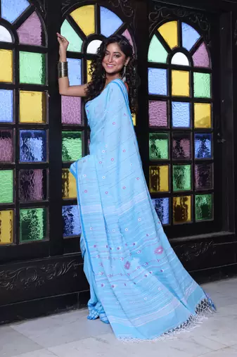 Sky blue cotton handwoven saree with floral buttas
