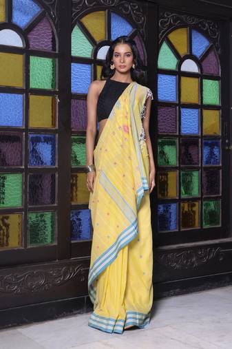 Yellow cotton handwoven saree with floral buttas