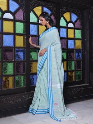 Pistachio green cotton handwoven saree with floral buttas 2