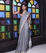 Grey cotton handwoven saree with texture motifs