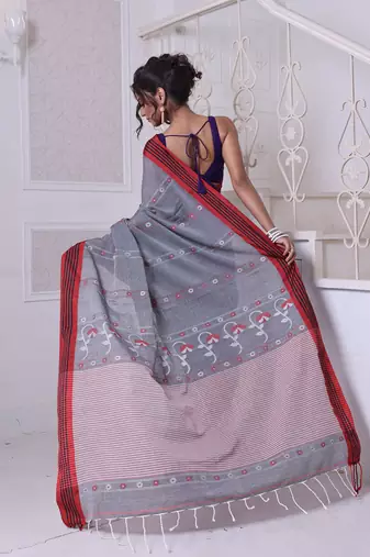 Grey cotton handwoven saree with floral buttas