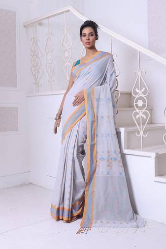 Ecru cotton handwoven saree with floral buttas