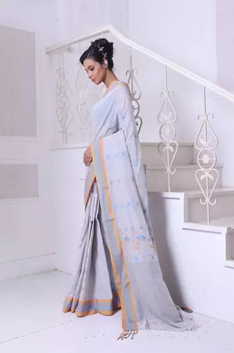 Ecru cotton handwoven saree with floral buttas