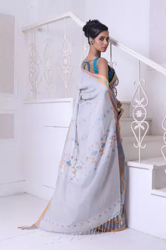 Ecru cotton handwoven saree with floral buttas