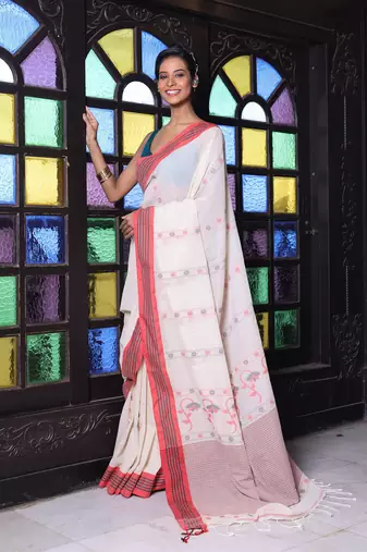 Beige cotton handwoven saree with floral buttas
