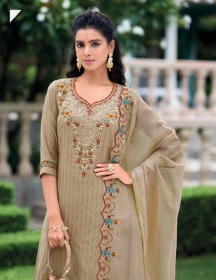Light beige hand work soft silk tulip pant suits with organza dupatta 2