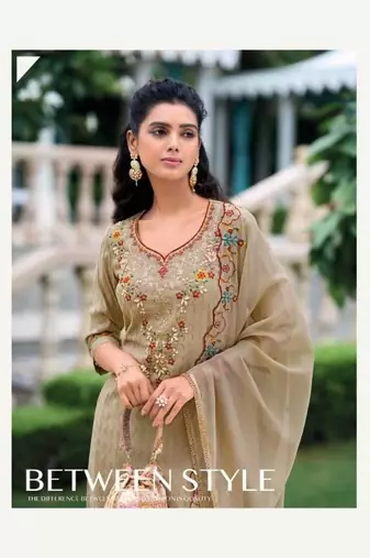 Light beige hand work soft silk tulip pant suits with organza dupatta