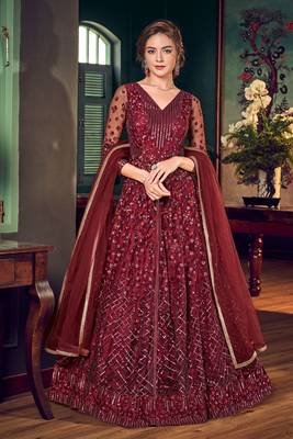Maroon embroidered net semi stitched anarkali pant suit. 1
