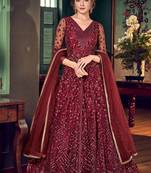 Maroon embroidered net semi stitched anarkali pant suit.