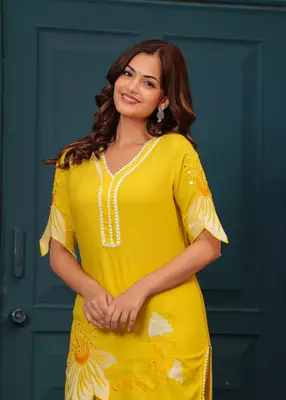 Yellow embroidered rayon kurta and pant set 5