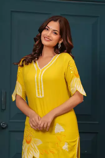 Yellow embroidered rayon kurta and pant set