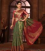 Green woven design kanjeevaram silk blend saree with blouse