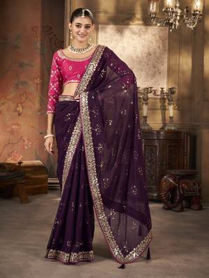 Wine purple saree in georgette with embroidered  border and floral buttis along with unstitched blouse 1