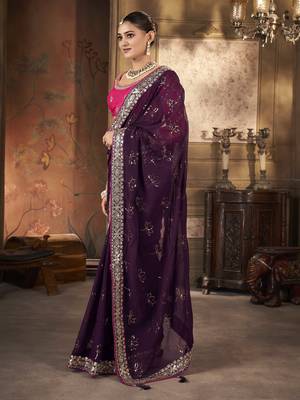 Wine purple saree in georgette with embroidered  border and floral buttis along with unstitched blouse 2
