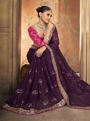 Wine purple saree in georgette with embroidered  border and floral buttis along with unstitched blouse 3