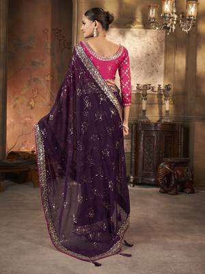 Wine purple saree in georgette with embroidered  border and floral buttis along with unstitched blouse 5
