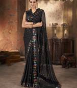 Black georgette solid embellished & sequined saree with unstitched blouse