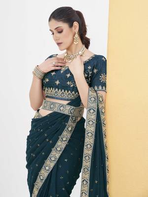 Tealblue georgette solid embellished & sequined saree with unstitched blouse 5