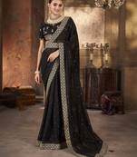 Black georgette solid embellished & sequined saree with unstitched blouse