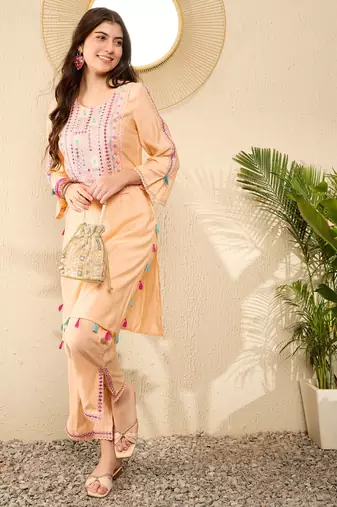 Women Peach color viscose rayon mirror work fancy kurta and bottom set
