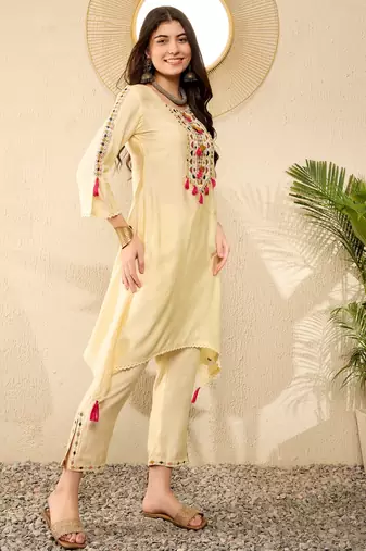 Women Yellow color viscose rayon thread work fancy kurta and bottom set