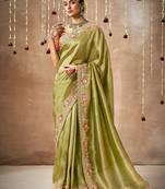 Organza silk embroidered bollywood saree in green