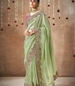 Organza silk embroidered sea green different style saree