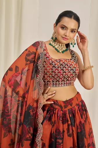  Rust Brown Zari Dori And Sequins Embroidery On Floral Printed Organza Lehenga Choli For Partywear