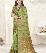 Sangam prints light green organza woven work festival saree