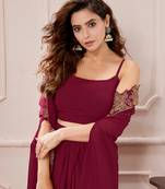 Janasya women's maroon georgette zari embroidered crop top with skirt & cape set
