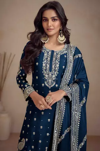 Teal blue embroidered chinnon free size stitched straight palazzo suit. ( size upto 42)