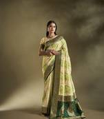 Elora pure soft silk woven designed banarasi saree (cream & light green)