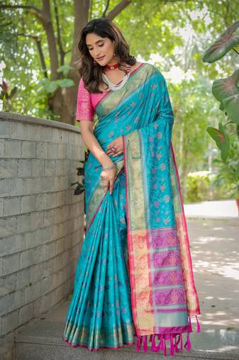 Soft patola silk rich pallu and contrast zari border all over the saree with brocade blouse
