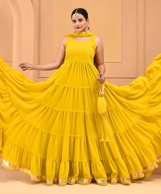 Mustard floor length tiered anarkali  paired with dupatta and potli bag 2