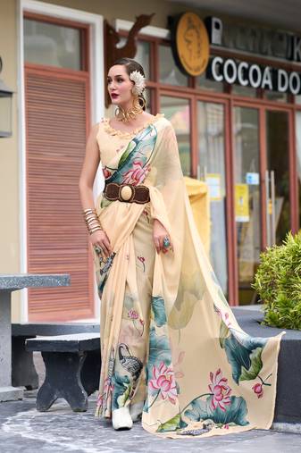 Cream designer printed pure georgette saree with blouse