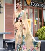 Cream designer printed georgette saree with blouse