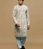 Sanwara men's printed orange & blue chikankari kurta & salwar set with sequin accents.