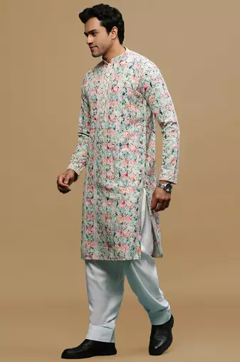Sanwara men's printed pink & blue chikankari kurta & salwar set with sequin accents.