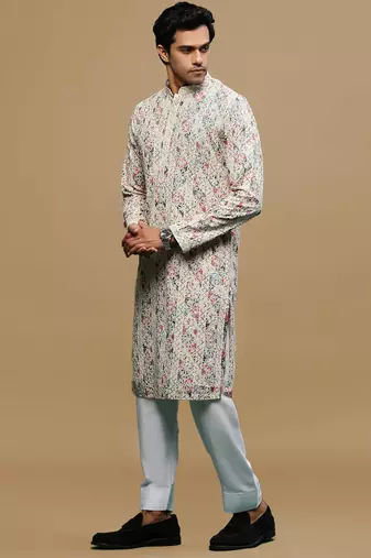 Sanwara men's printed red & blue chikankari kurta & salwar set with sequin accents.