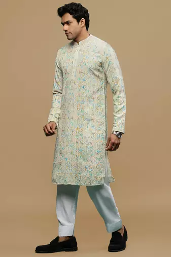 Sanwara men's printed yellow & sky blue chikankari kurta & salwar set with sequin accents.
