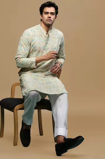 Sanwara men's printed yellow & sky blue chikankari kurta & salwar set with sequin accents.
