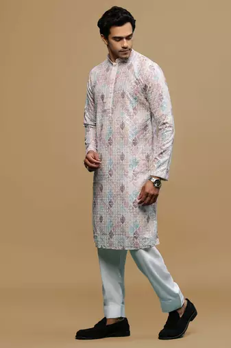 Sanwara men's printed rust chikankari kurta & salwar set with sequin accents.