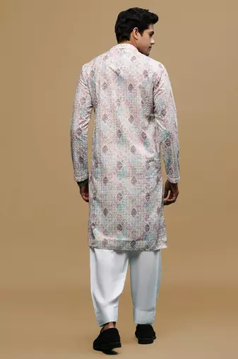 Sanwara men's printed rust chikankari kurta & salwar set with sequin accents.