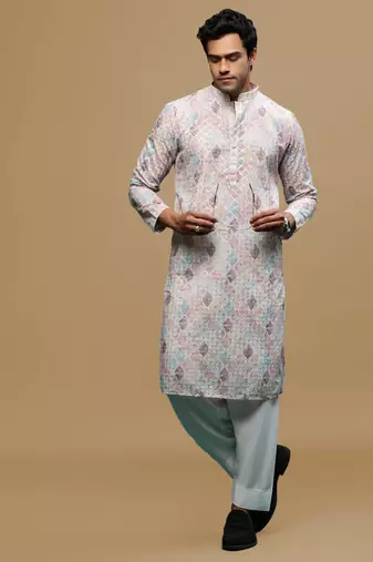 Sanwara men's printed rust chikankari kurta & salwar set with sequin accents.