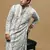 Sanwara men's printed off white & black chikankari kurta with alluring sequin accents.